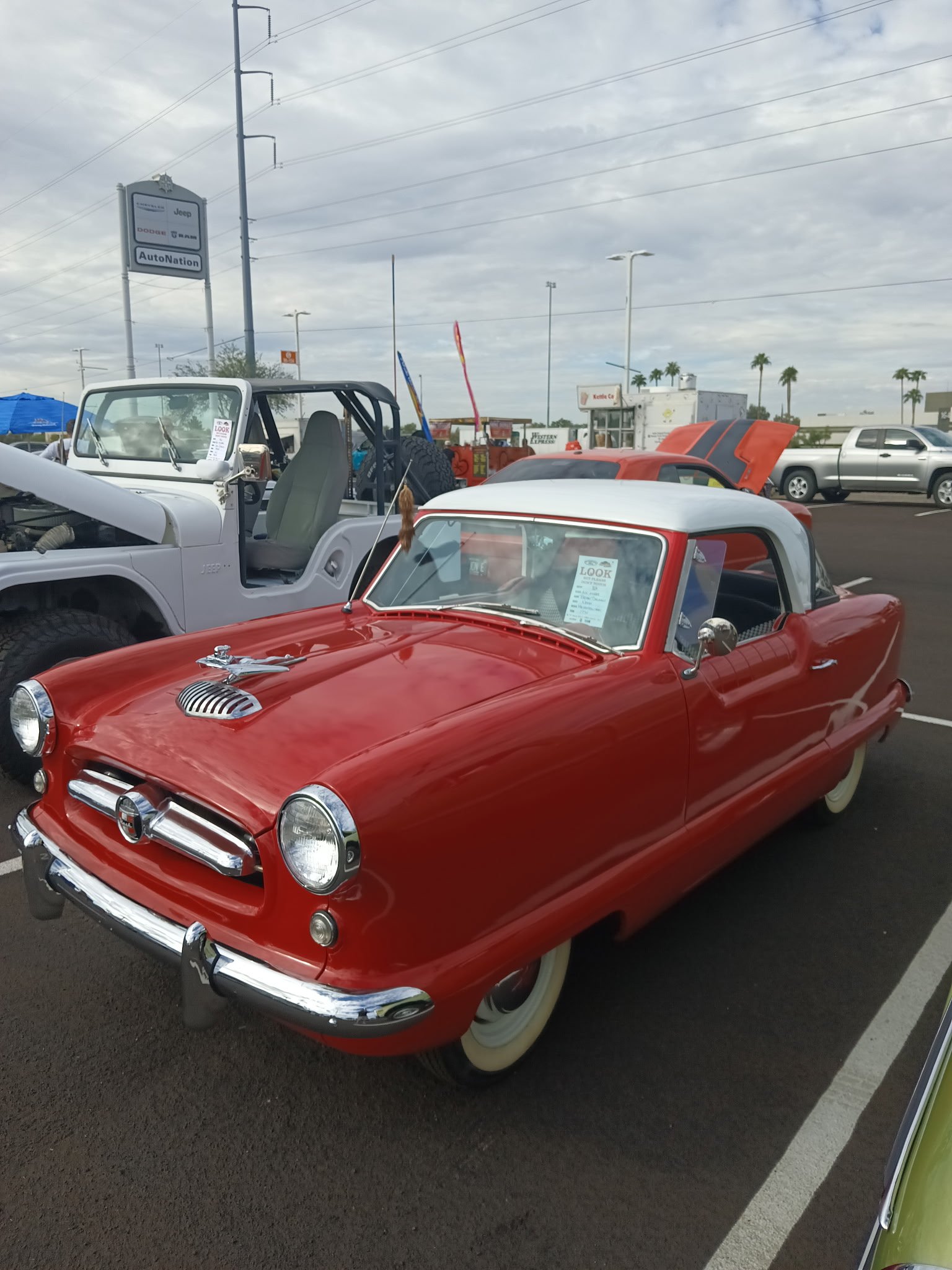 for ShuBrews Garage Bar

Classic red 1950s coupe with white wall tires displayed at Phoenix car show event